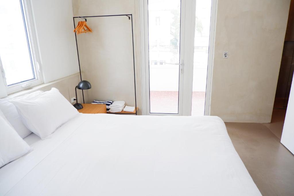 Postel nebo postele na pokoji v ubytování Stay at Mare