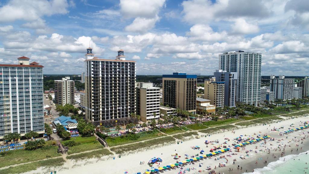 a city with lots of tall buildings and palm trees at Breakers Resort Hotel in Myrtle Beach