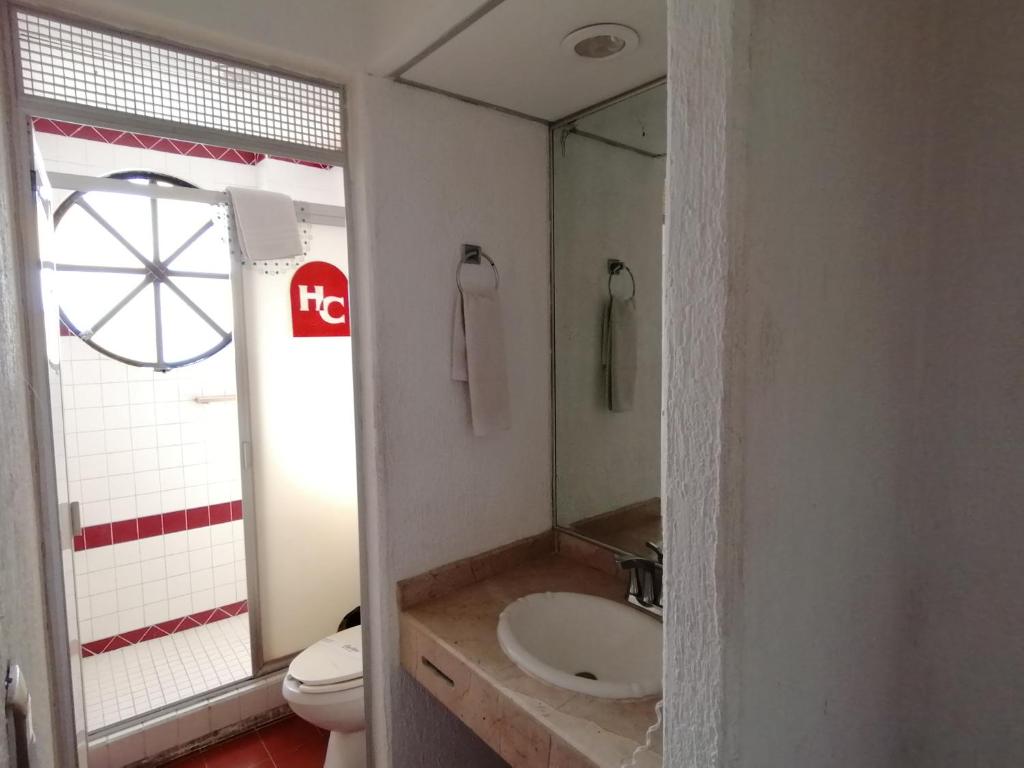 Koupelna v ubytování Hotel Candilejas Playa
