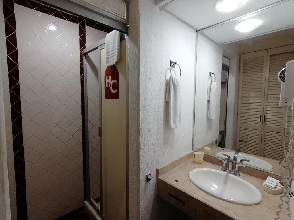 Koupelna v ubytování Hotel Candilejas Playa