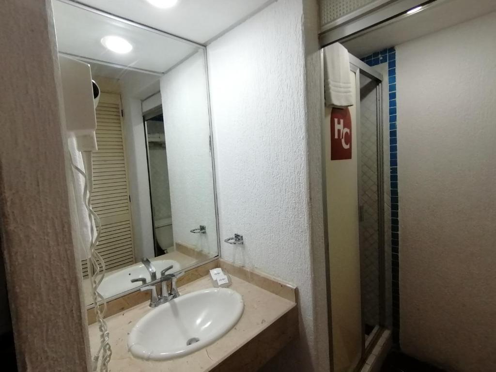 Koupelna v ubytování Hotel Candilejas Playa