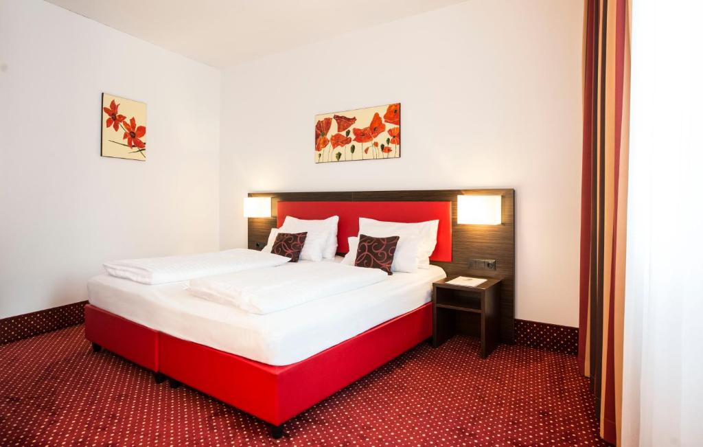 Postel nebo postele na pokoji v ubytování Best Western Plus Amedia Wien