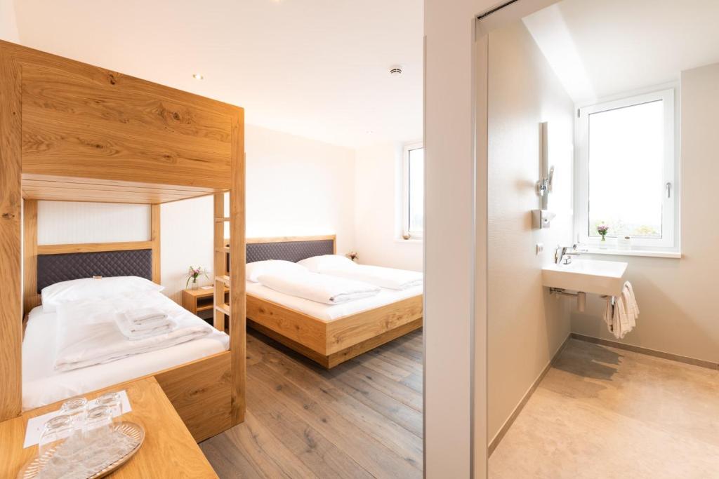 Postel nebo postele na pokoji v ubytování Motel Keckeis Inn - Self Check-in