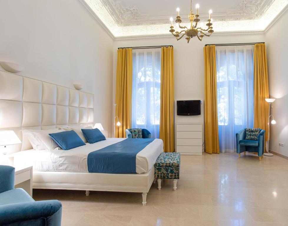 Posteľ alebo postele v izbe v ubytovaní Duke's Residence