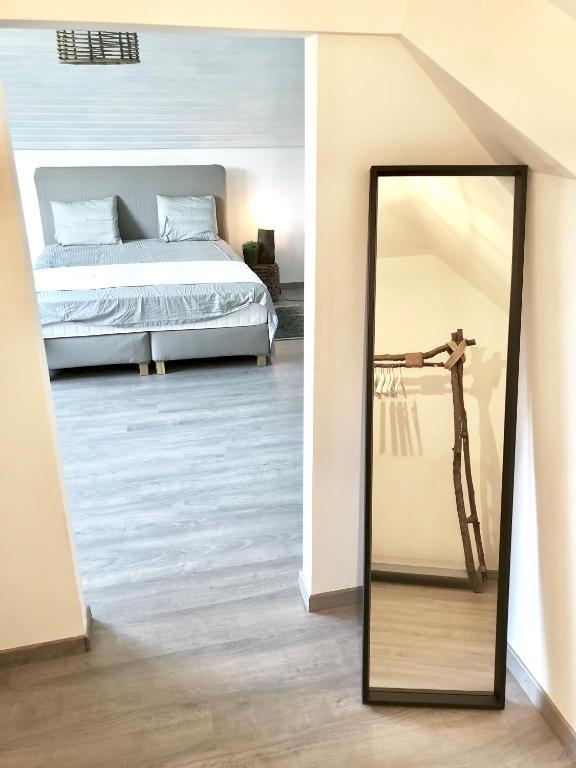 Postel nebo postele na pokoji v ubytování Gîte d'Anthisnes