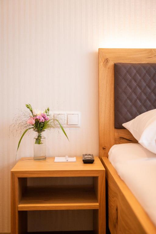Postel nebo postele na pokoji v ubytování Motel Keckeis Inn - Self Check-in