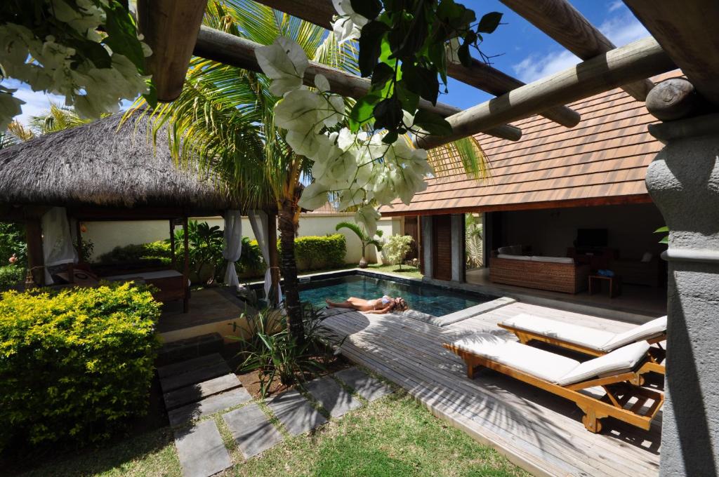Zahrada ubytování Oasis Villas by Fine & Country