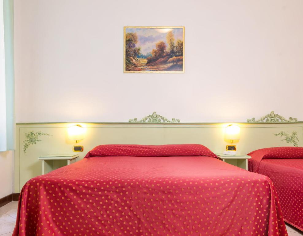 Cama o camas de una habitaci&oacute;n en Guesthouse Ca&#39; San Marcuola 1