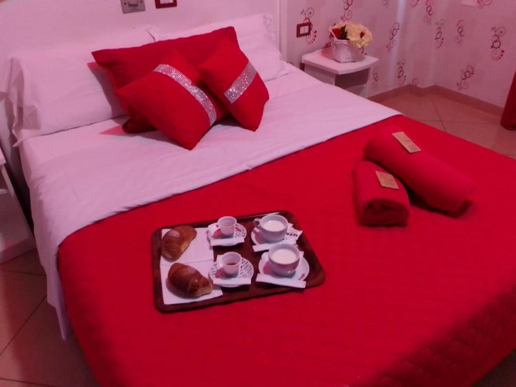 Postel nebo postele na pokoji v ubytování Hotel Tiffany