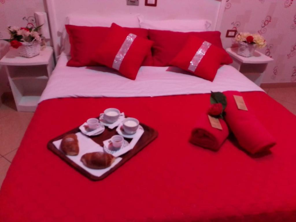 Postel nebo postele na pokoji v ubytování Hotel Tiffany