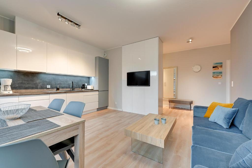 TV a/nebo společenská místnost v ubytování Comfort Apartments Rajska