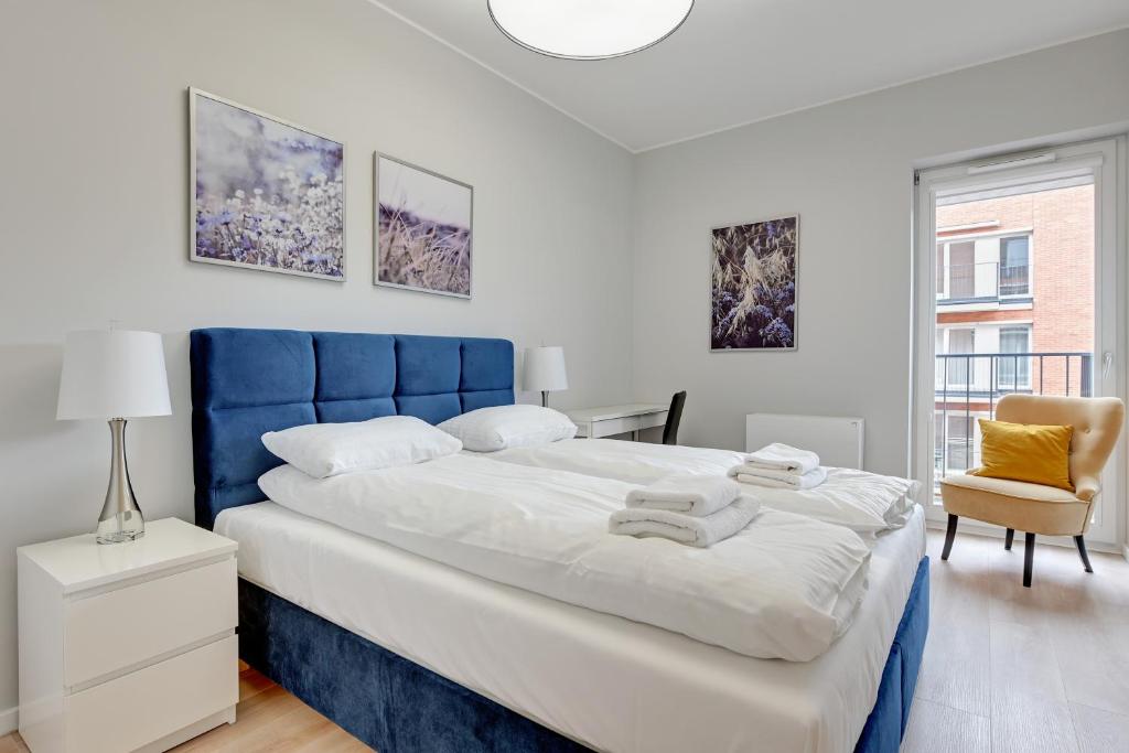 Postel nebo postele na pokoji v ubytování Comfort Apartments Rajska