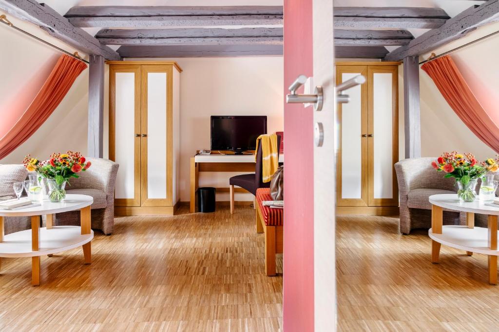 TV a/nebo společenská místnost v ubytování Hotel am Jungfernstieg