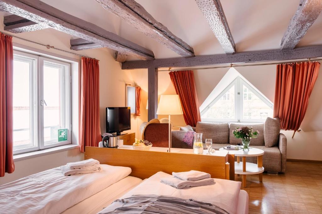 Postel nebo postele na pokoji v ubytování Hotel am Jungfernstieg