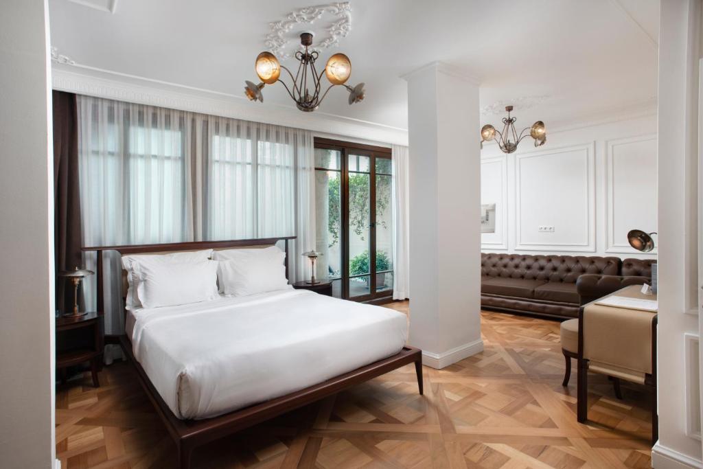 Postel nebo postele na pokoji v ubytování Georges Hotel Galata