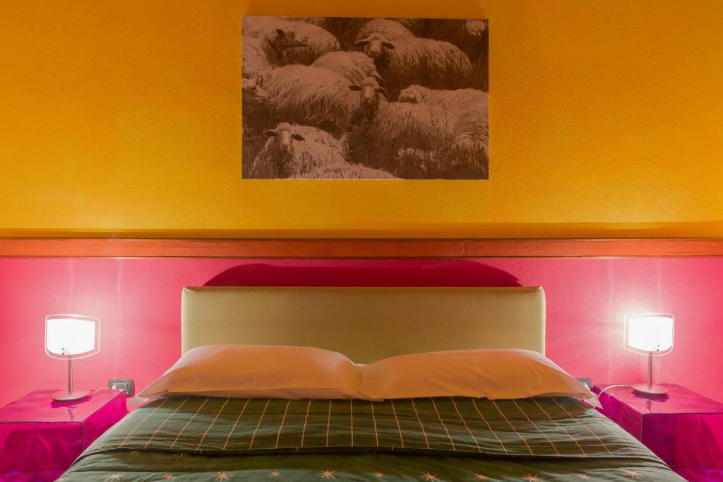 Postel nebo postele na pokoji v ubytování Janas Country Resort