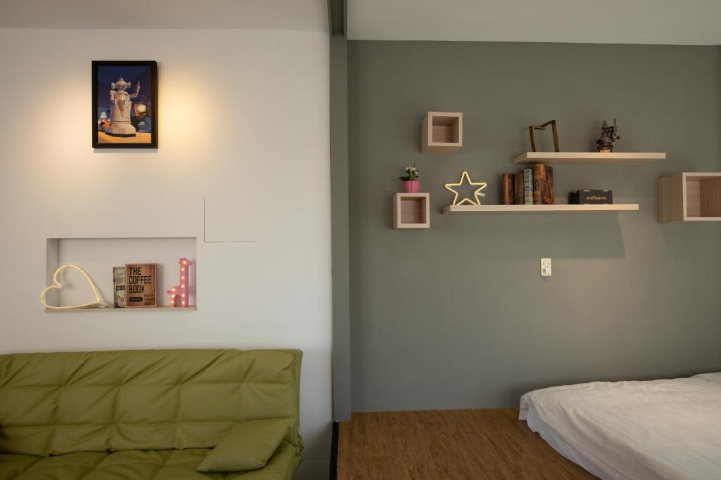 Postel nebo postele na pokoji v ubytování YouI98 Guesthouse一層一戶大坪數套房#本國旅客須先匯款