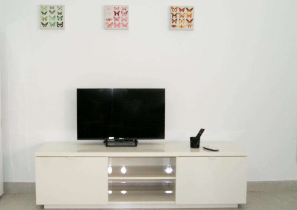 TV a/nebo společenská místnost v ubytování Apartamento El Andén de la Estación