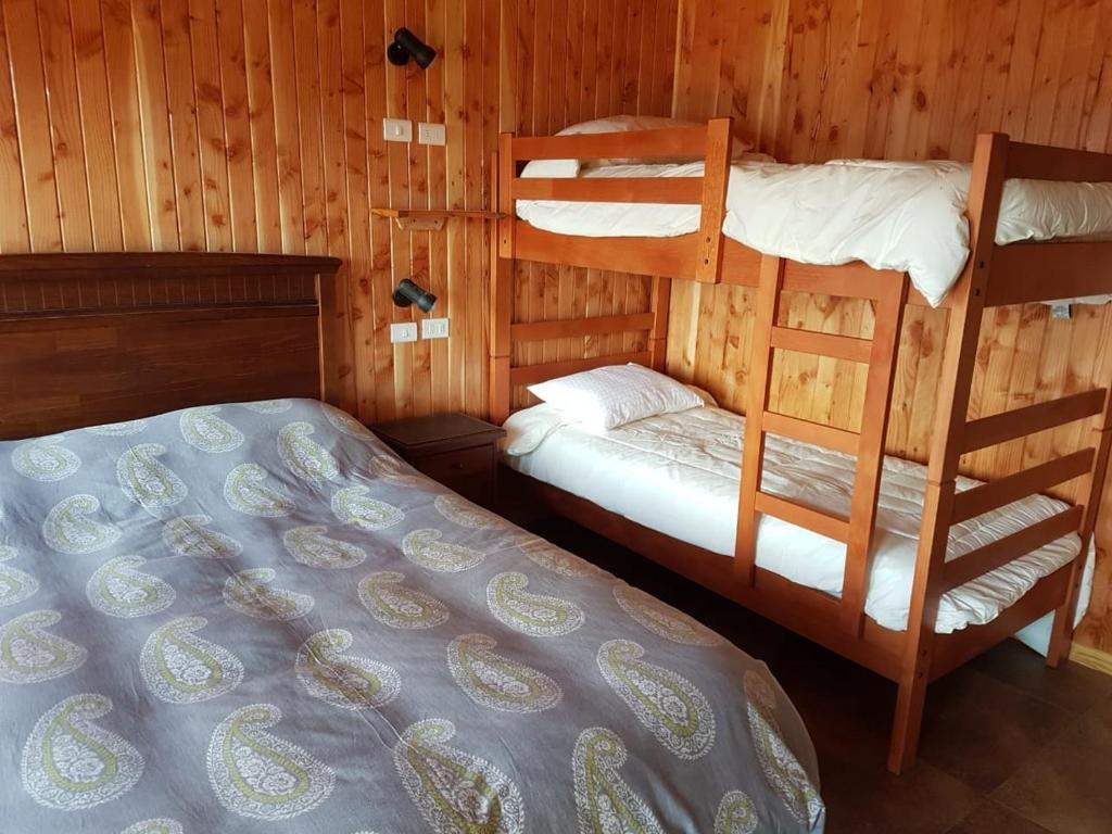 Postel nebo postele na pokoji v ubytování Patagonia Acres Lodge