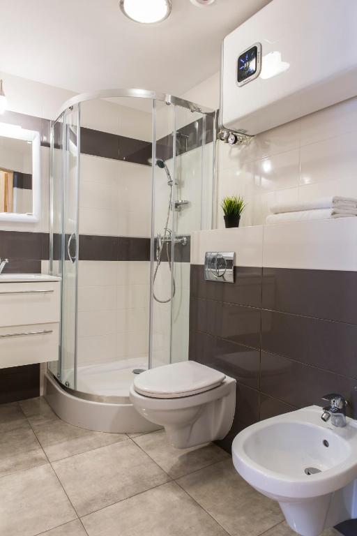 Kúpeľňa v ubytovaní udanypobyt Apartamenty Przy Dolinach A i B