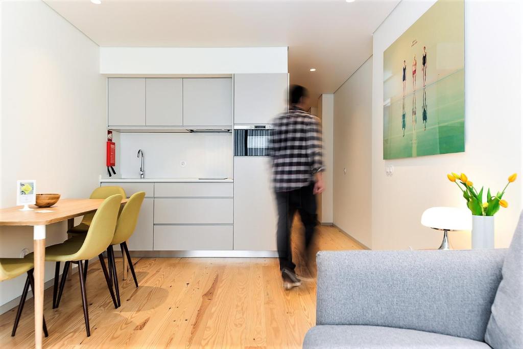 Kuchyň nebo kuchyňský kout v ubytování Bom Jardim Apartments