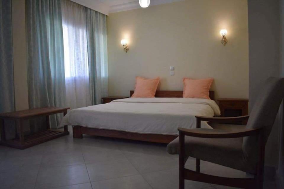 Postel nebo postele na pokoji v ubytování HOTEL MENABE