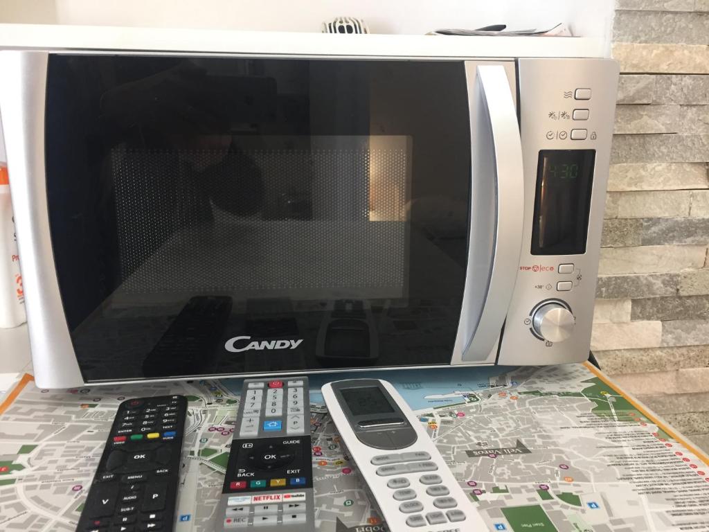 Televízia a/alebo spoločenská miestnosť v ubytovaní ST-Gallery Apartment
