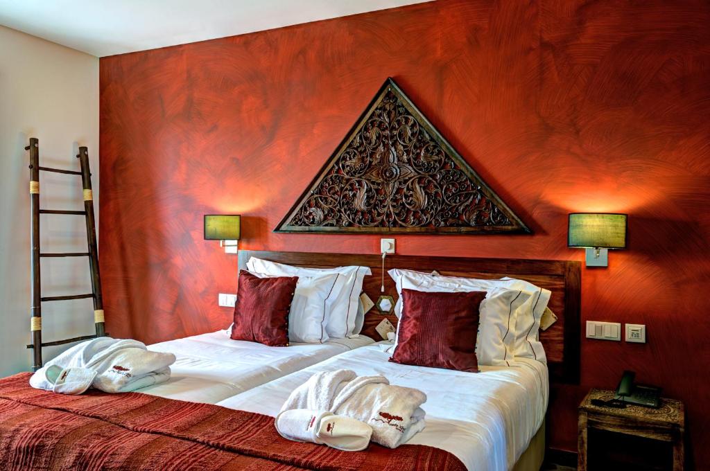 Postel nebo postele na pokoji v ubytování Monte Xisto Country Charm Hotel