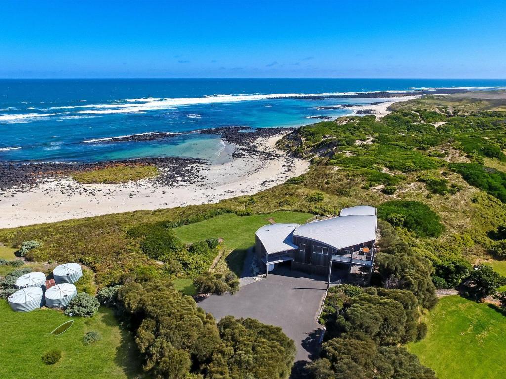 an aerial view of a house and a beach at Port Fairy Beach House in Port Fairy