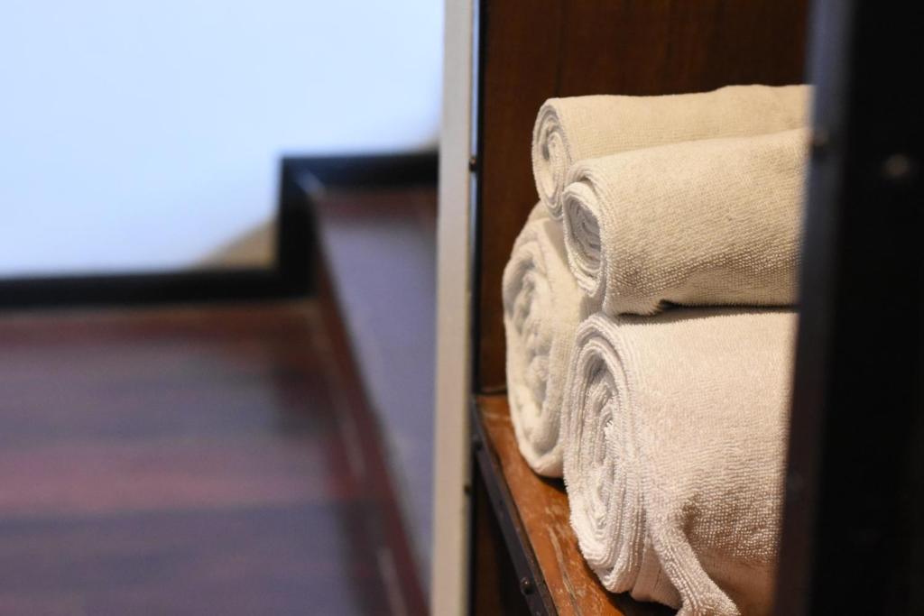 Postel nebo postele na pokoji v ubytování Cacha Hotel
