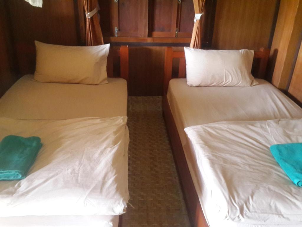 Postel nebo postele na pokoji v ubytování Phu View Guesthouse