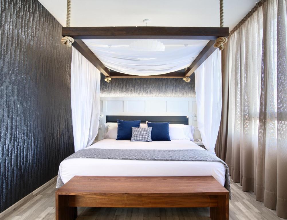 Postel nebo postele na pokoji v ubytování Hotel Luze El Villa