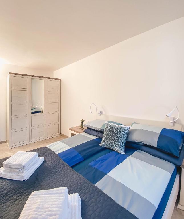 Postel nebo postele na pokoji v ubytování Salinea Apartments