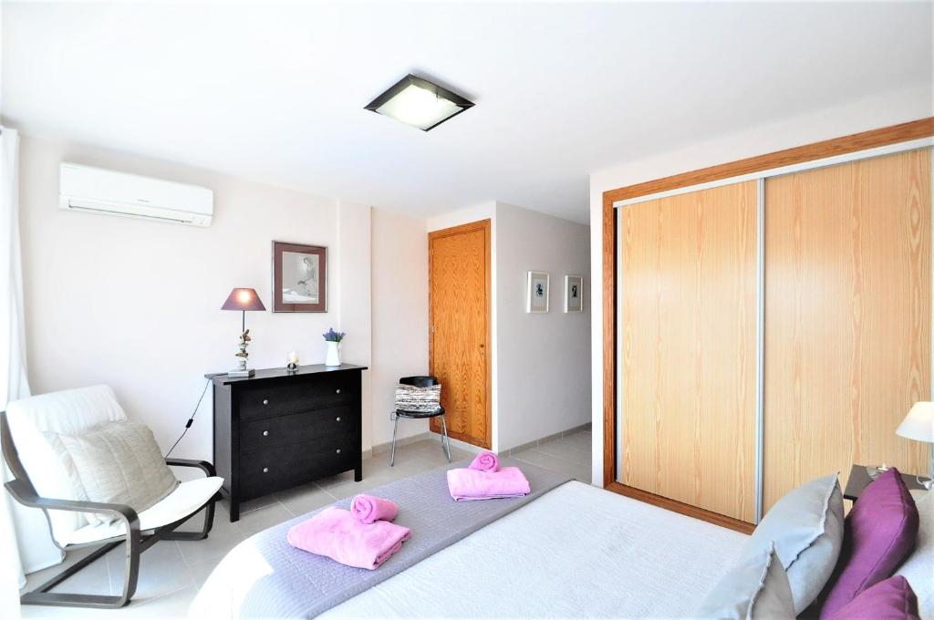 Postel nebo postele na pokoji v ubytování ES PAS- Chalet en Cala Pi muy solicitado