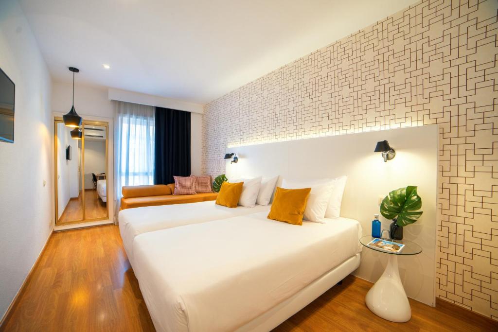 Postel nebo postele na pokoji v ubytování Hotel Cetina Murcia