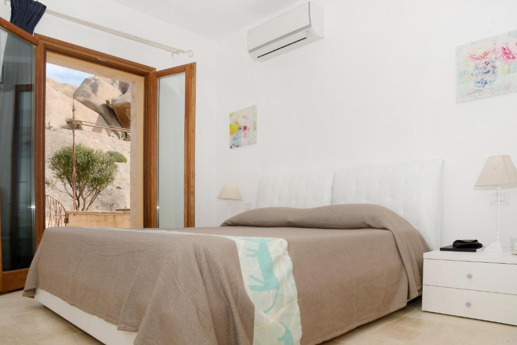 Postel nebo postele na pokoji v ubytování Dolce Vita Boutique Hotel