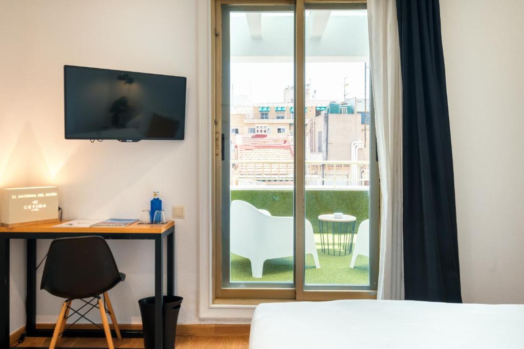 Postel nebo postele na pokoji v ubytování Hotel Cetina Murcia