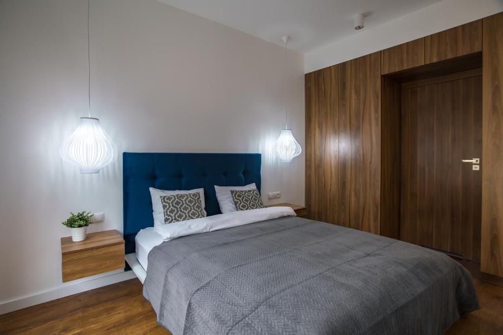 Posteľ alebo postele v izbe v ubytovaní Homewell Apartments Dominikańska