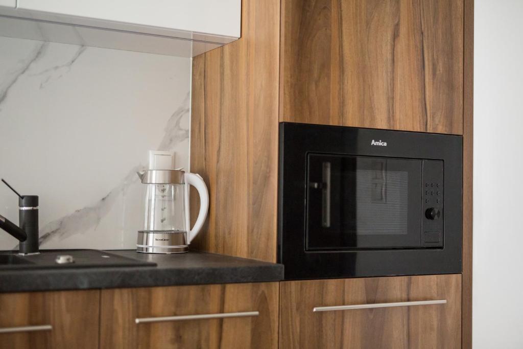 Kuchyňa alebo kuchynka v ubytovaní Homewell Apartments Dominikańska