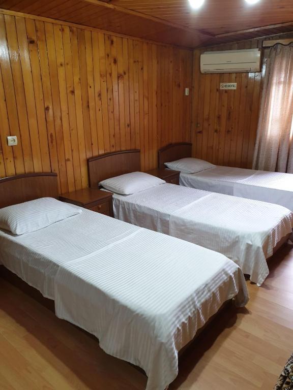 Postel nebo postele na pokoji v ubytování Hotel Old Star