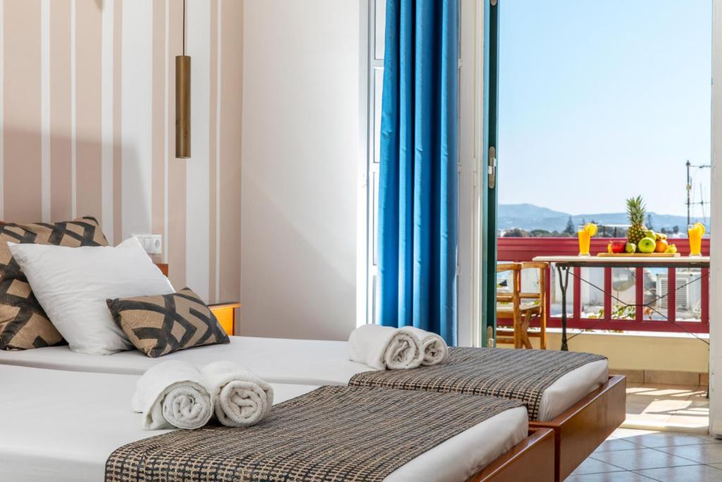 Posteľ alebo postele v izbe v ubytovaní Hotel Palatia