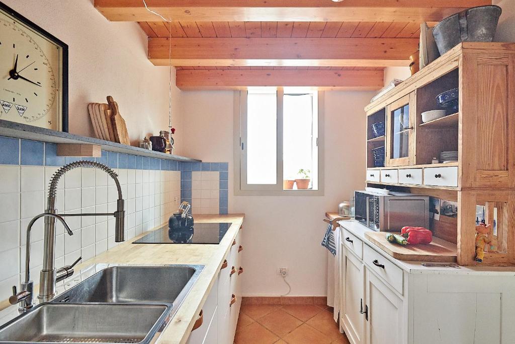 Kuchyňa alebo kuchynka v ubytovaní Solemar Sicilia - Casa Olivia