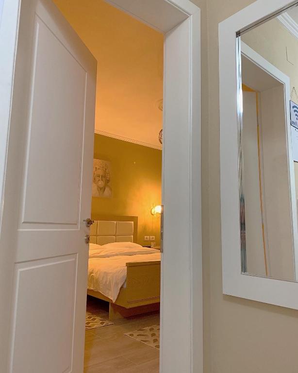 Postel nebo postele na pokoji v ubytování Elite Apartments Korçë