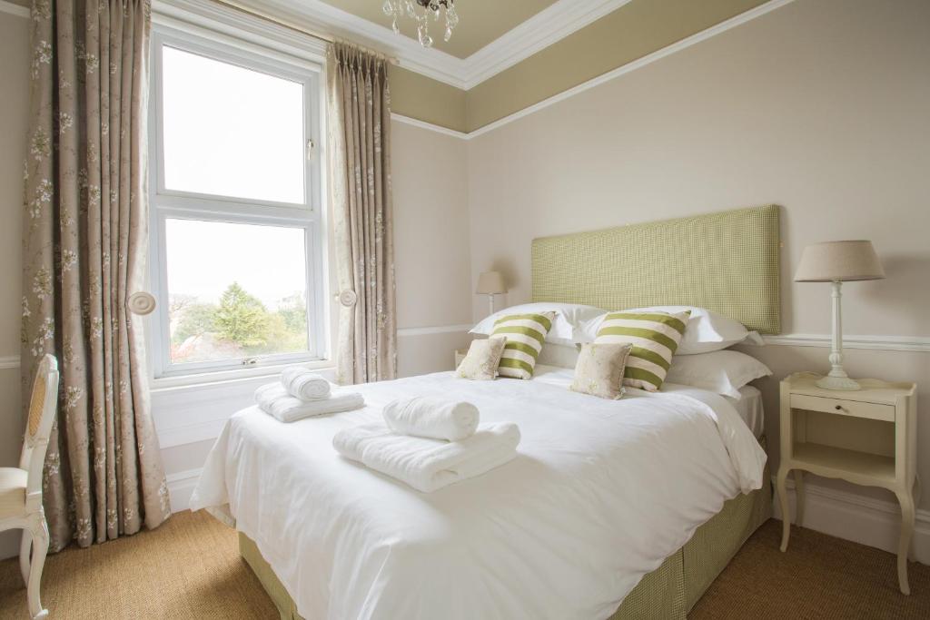 Postel nebo postele na pokoji v ubytování Grays Boutique B&B