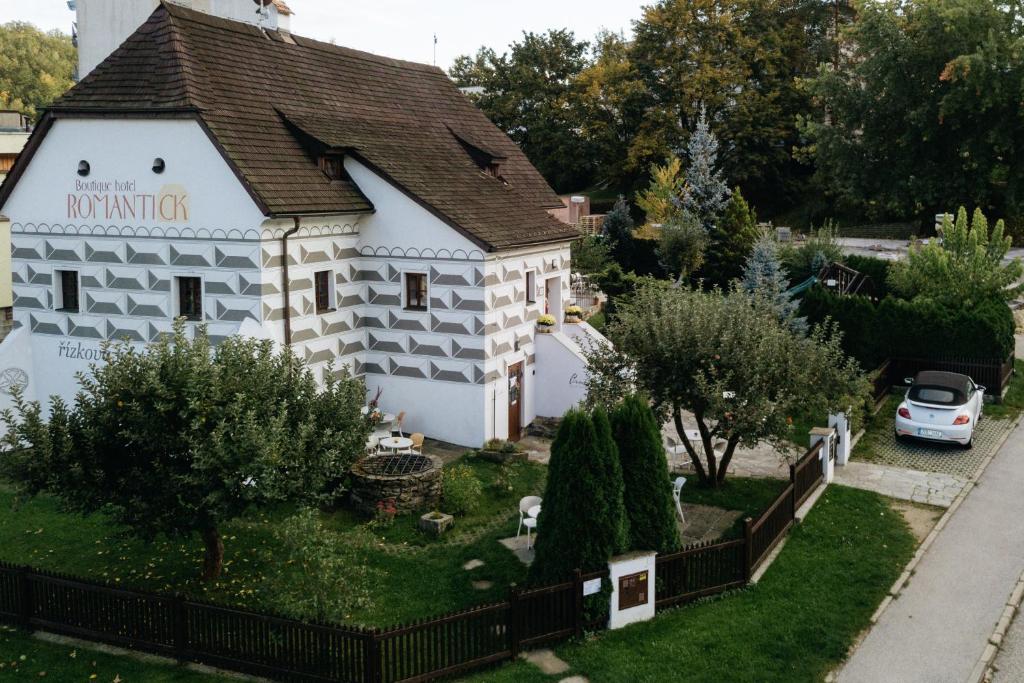 Κήπος έξω από το Boutique Hotel Romantick