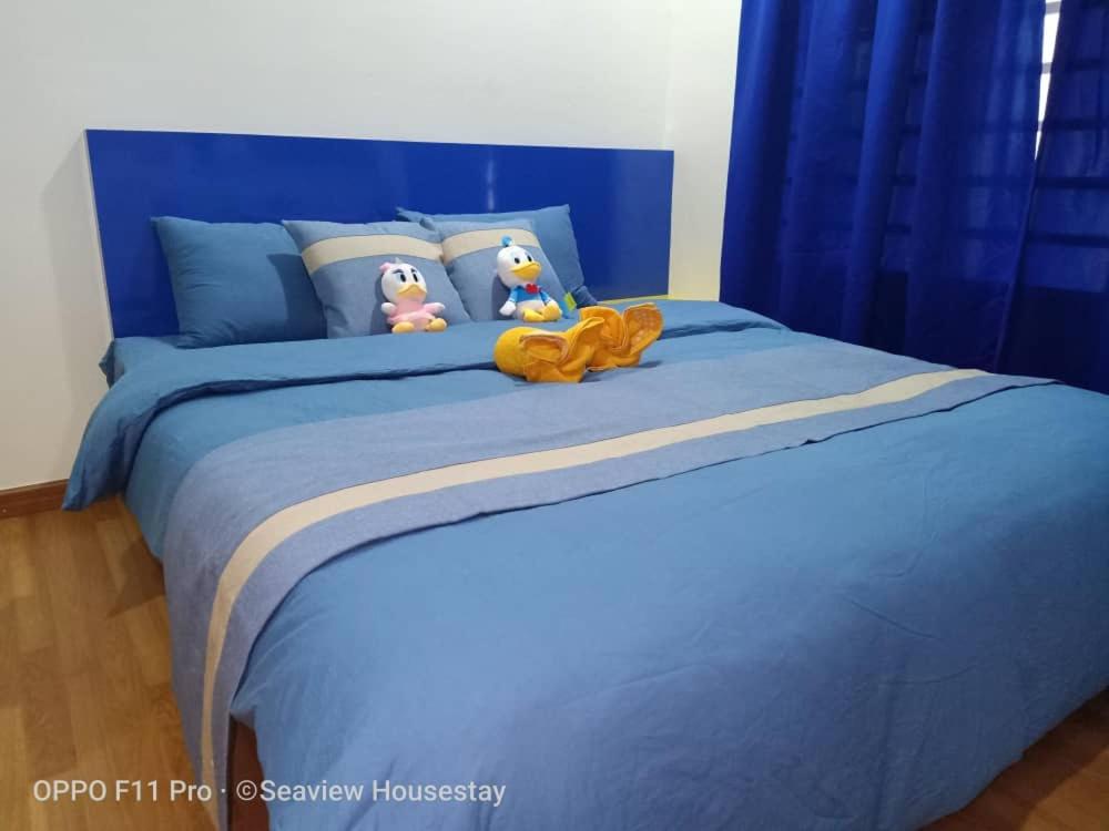 Postel nebo postele na pokoji v ubytování WindMill SunRise PaddyView Homestay