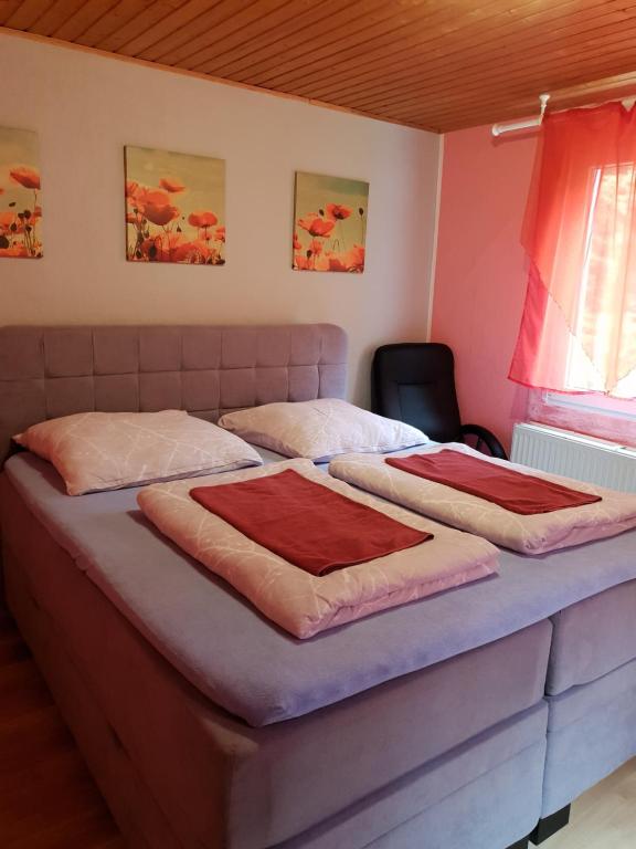 Un pat sau paturi într-o cameră la Aparthotel