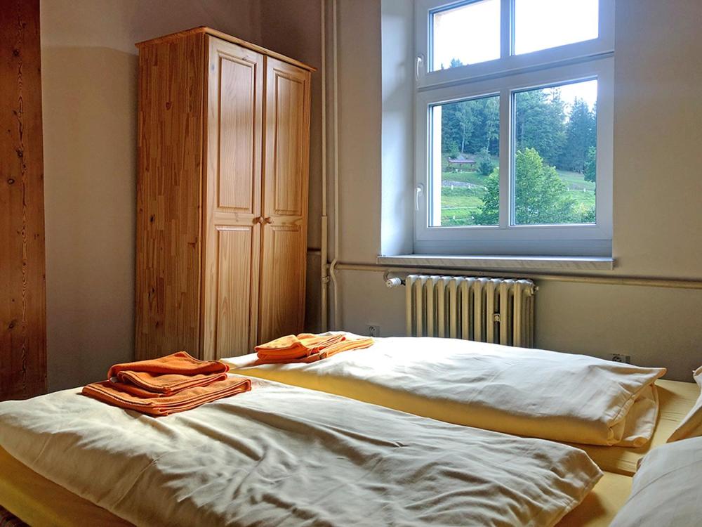 Postel nebo postele na pokoji v ubytování Penzion Sally