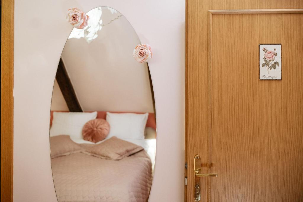 Ένα ή περισσότερα κρεβάτια σε δωμάτιο στο Boutique Hotel Romantick