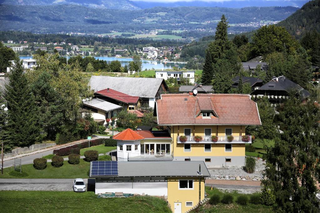 an aerial view of a house with a solar roof at Gästehaus Elisabeth in Oberaichwald